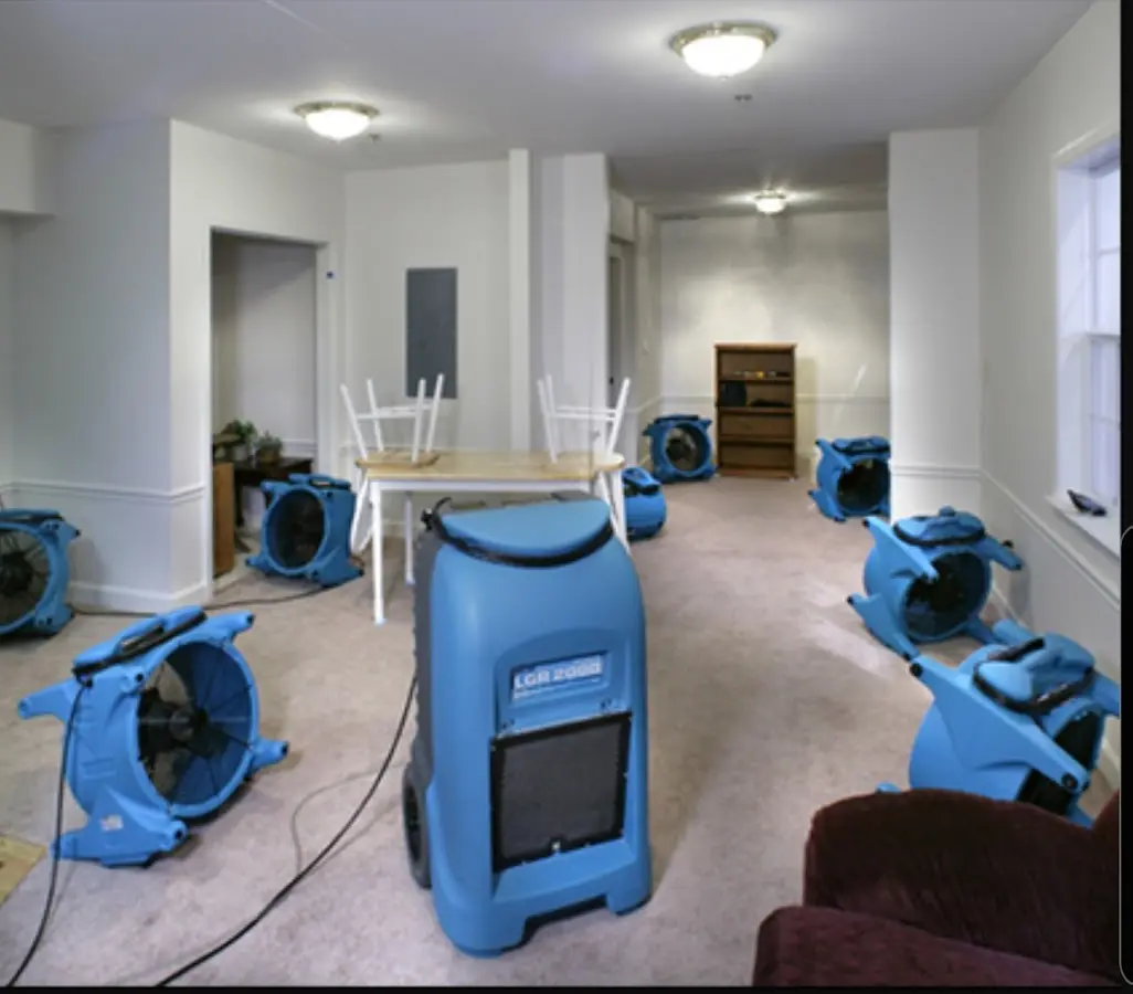 Air movers and dehumidifier setup for Water Extraction & Removal in Darlington
